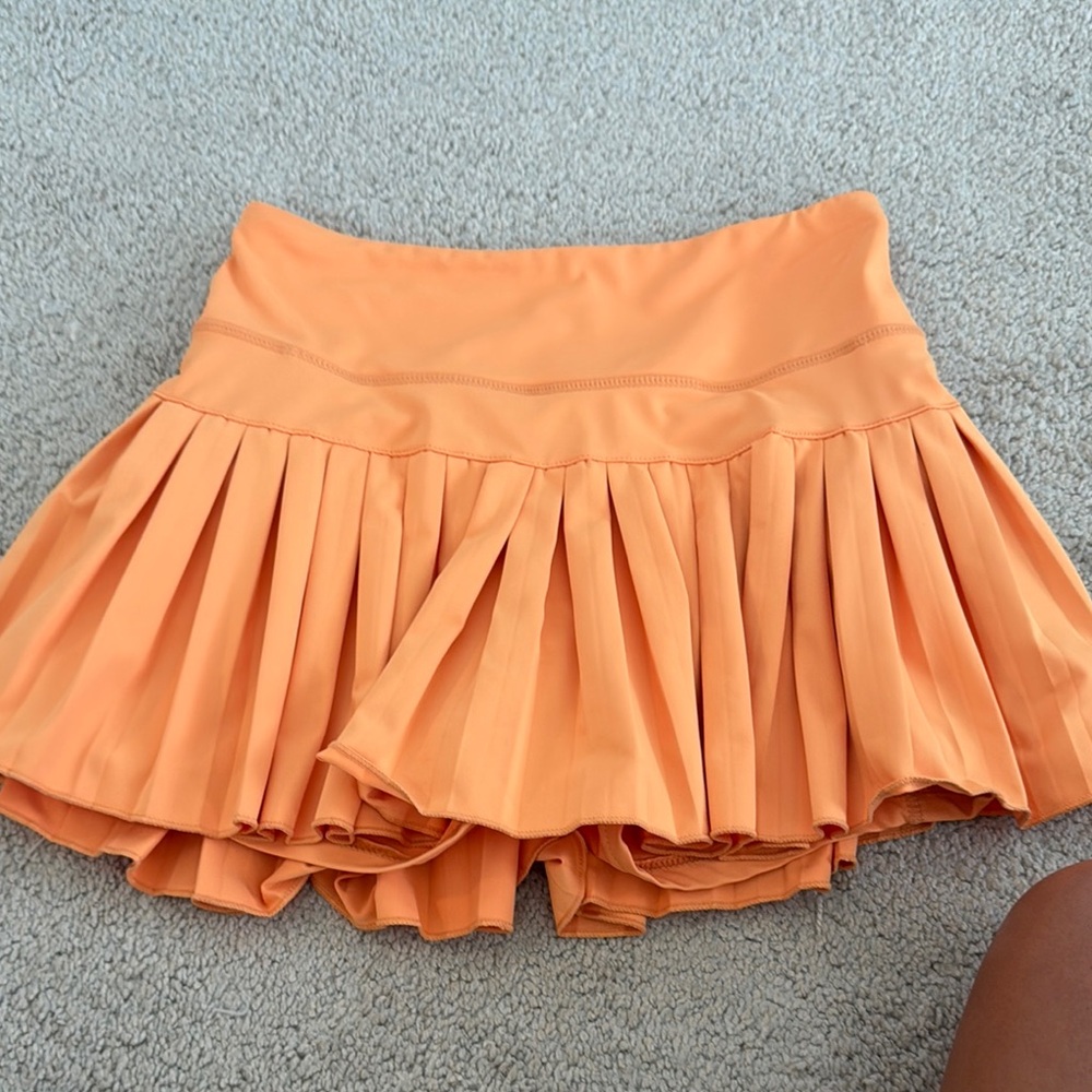 Orange gold hinge skirt